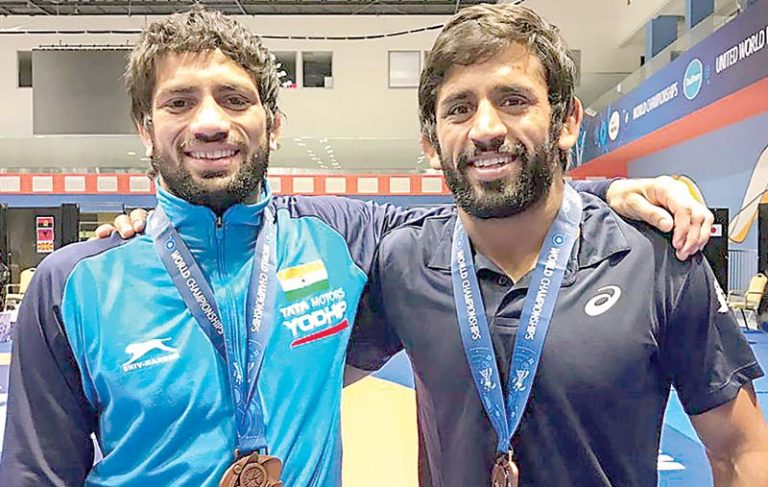 ओलंपिक कोटा हासिल कर चुके महाबली सतपाल के शिष्य रवि कुमार ने जीता स्वर्ण, बजरंग को रजत - divya ...